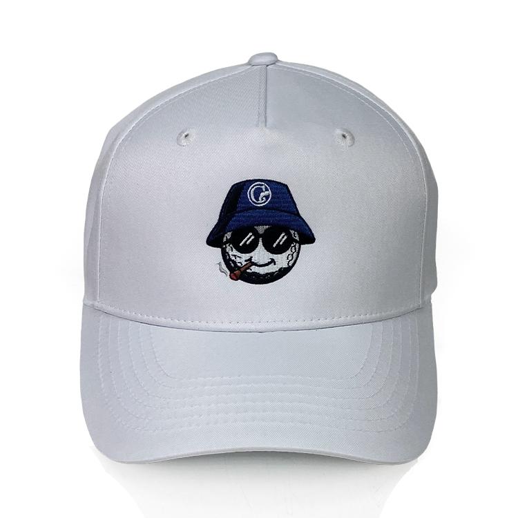 White baseball cap with an embroidered logo of a skull wearing a blue hat and smoking a pipe, centered on the front panel.